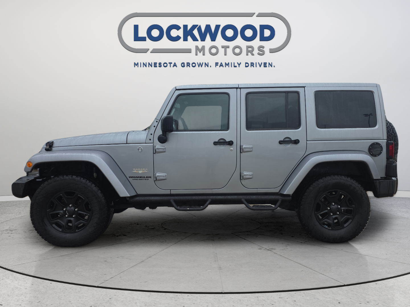 Used 2013 Jeep Wrangler Unlimited Sahara with VIN 1C4BJWEG3DL608727 for sale in Marshall, Minnesota